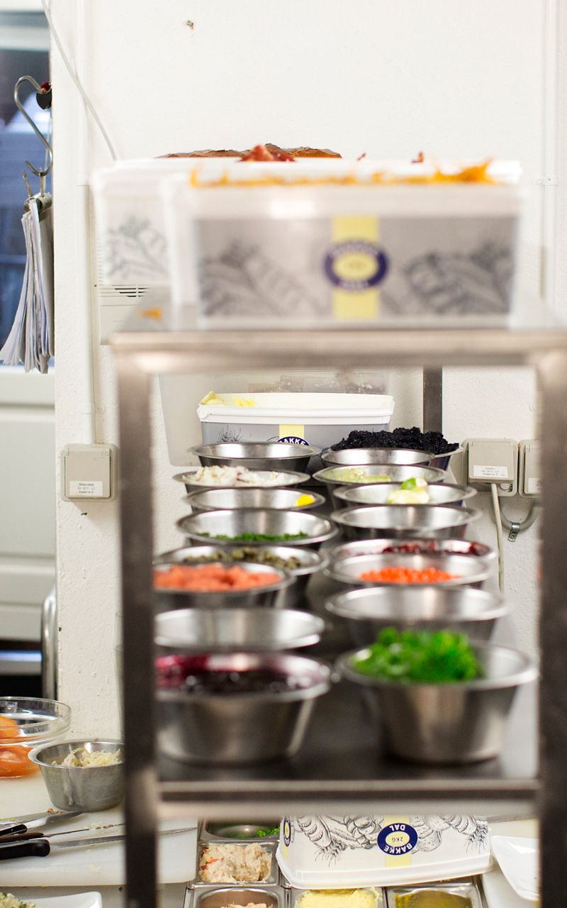 Professional kitchen with chefs preparing meals