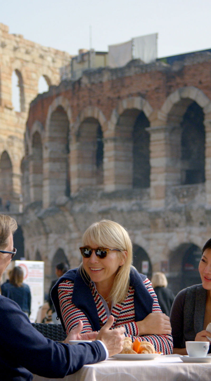 Outdoor dining near ancient Roman amphitheater