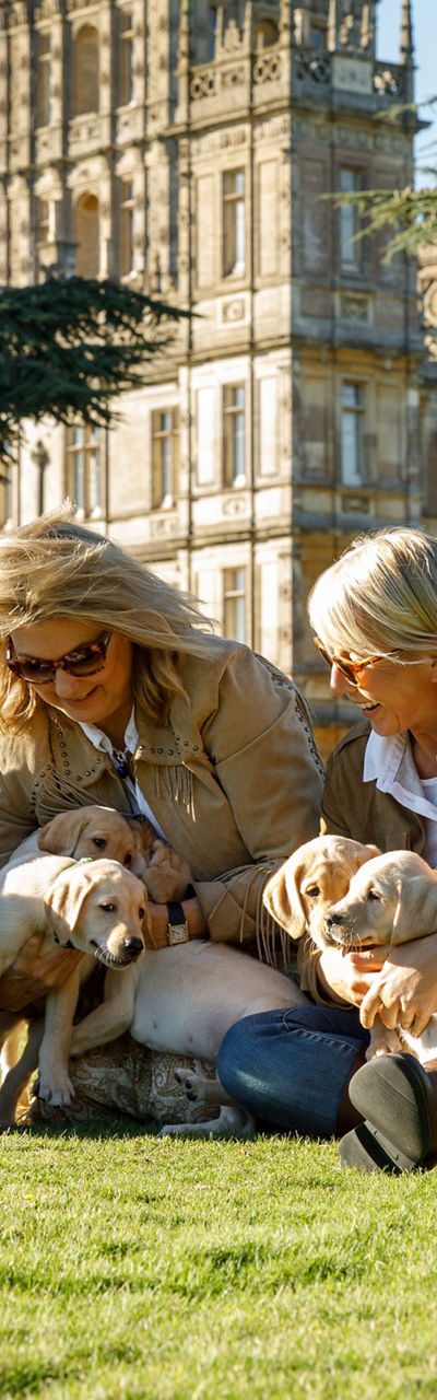 Family with dogs at historic estate