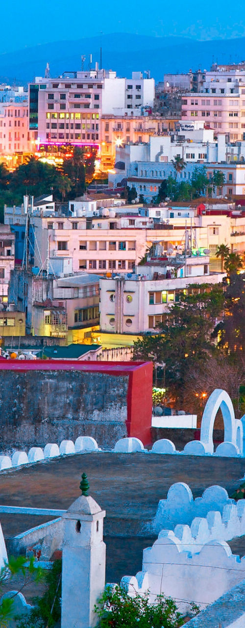 Tangier cityscape at sunset with vibrant lights