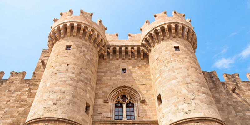 Medieval stone castle with twin towers