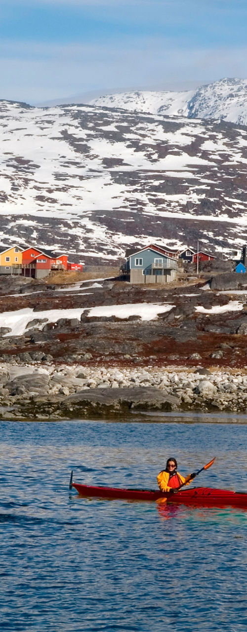 Group kayaking in Arctic waters