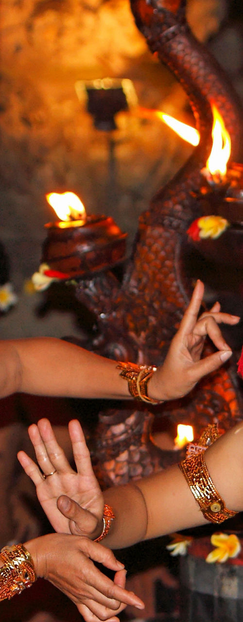 Traditional Balinese dancers in ornate costumes