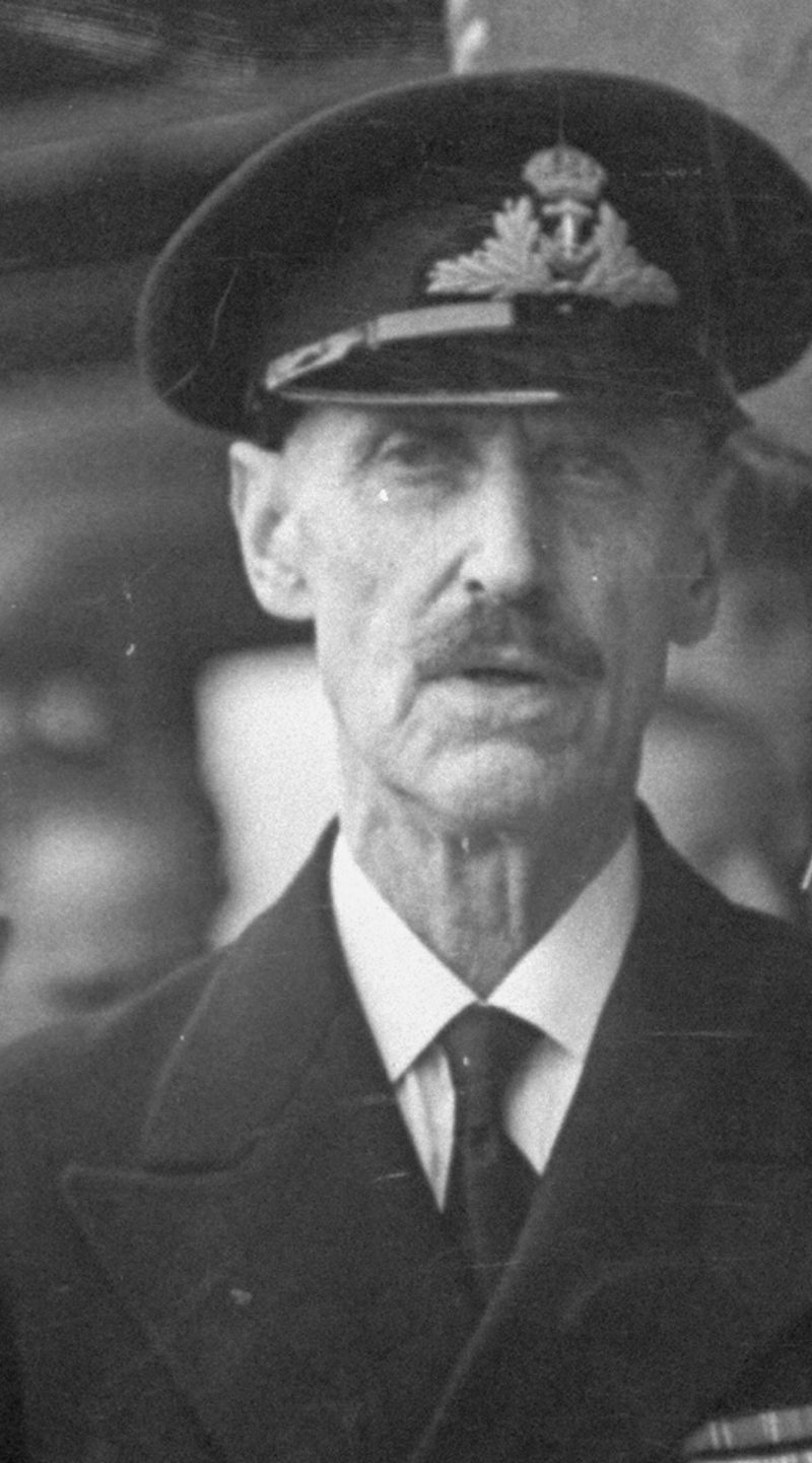 Naval officer speaking at BBC microphone