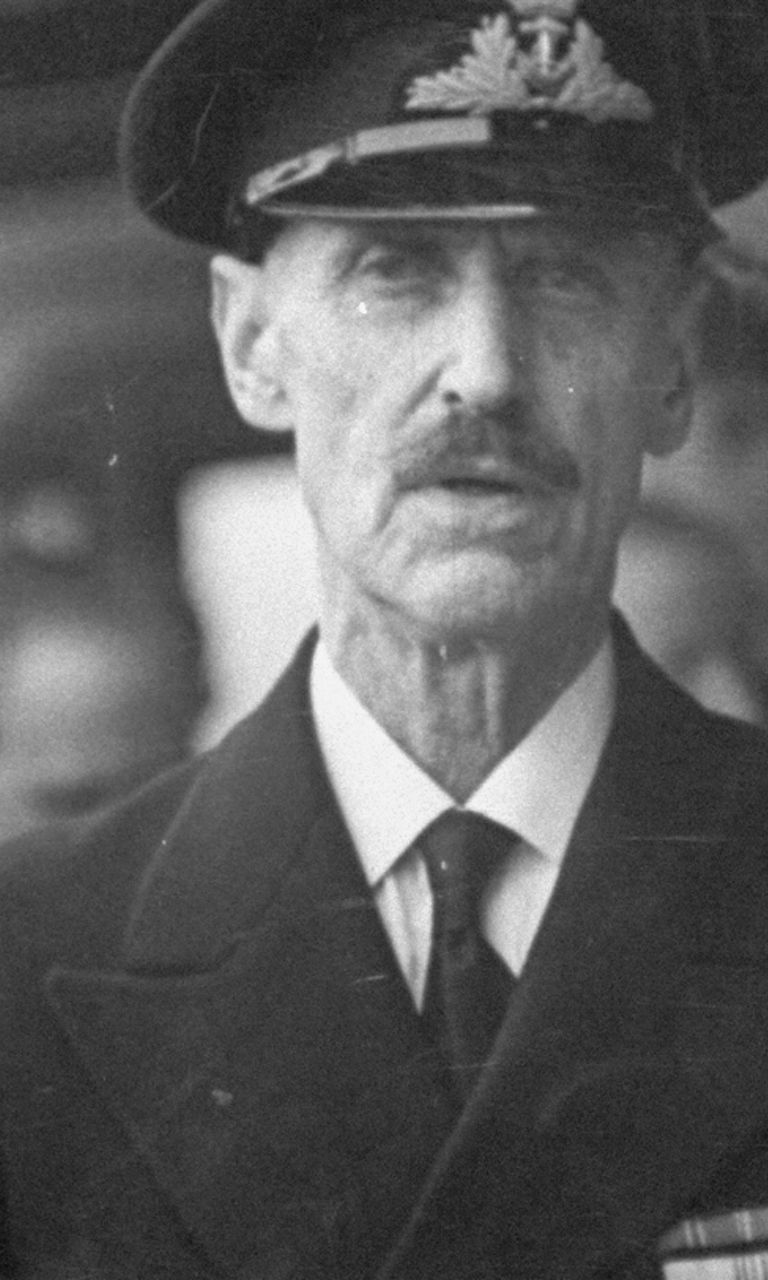 Naval officer speaking at BBC microphone