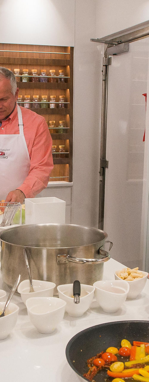 Cooking class with fresh vegetables and Viking aprons