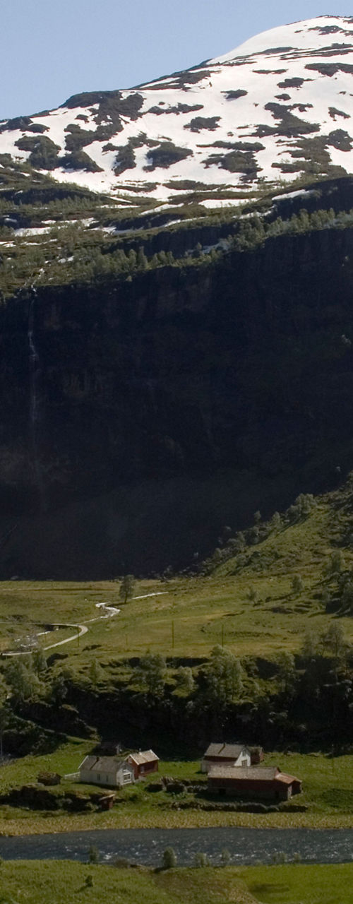 Scenic valley with snow-capped mountains