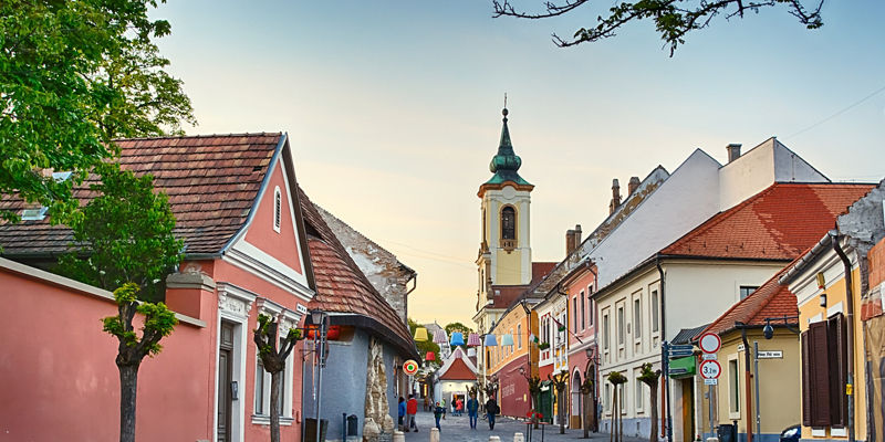 Charming European street with church tower