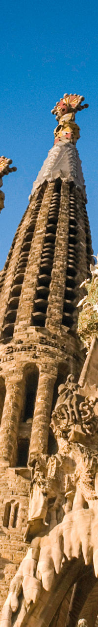 Sagrada Familia towers against blue sky