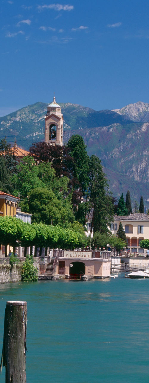 Scenic lakeside village with mountain backdrop
