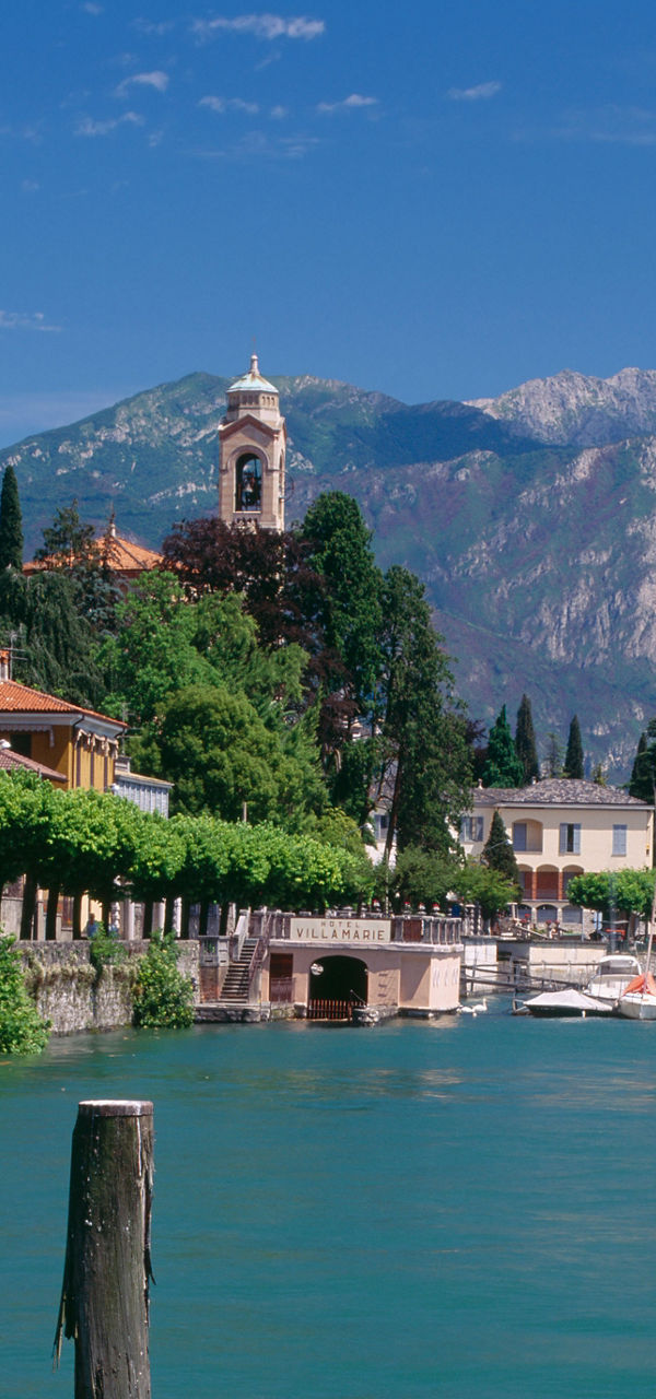 Scenic lakeside village with mountain backdrop