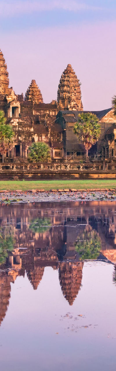 Angkor Wat temple at sunrise with reflection