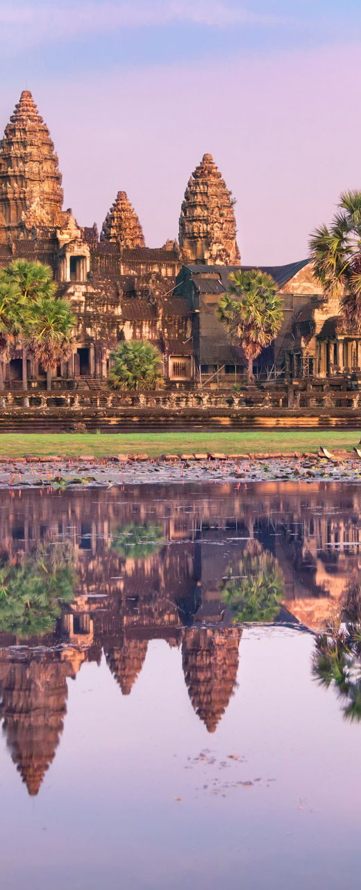 Angkor Wat temple at sunrise with reflection