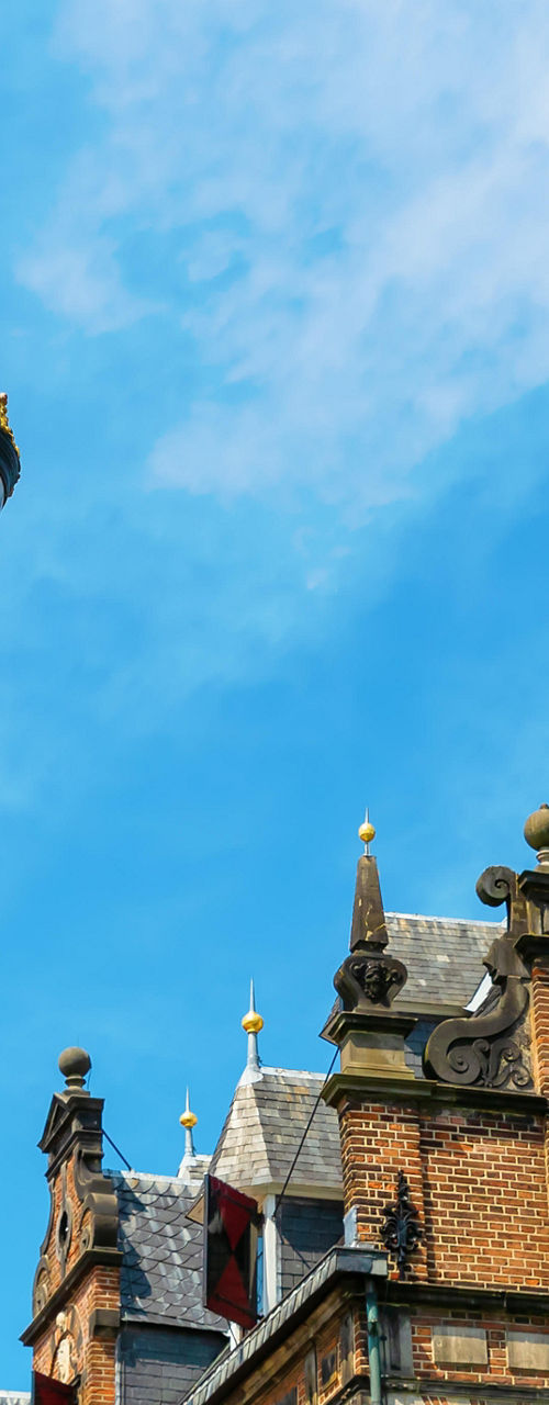 Historic European building with ornate lamp post