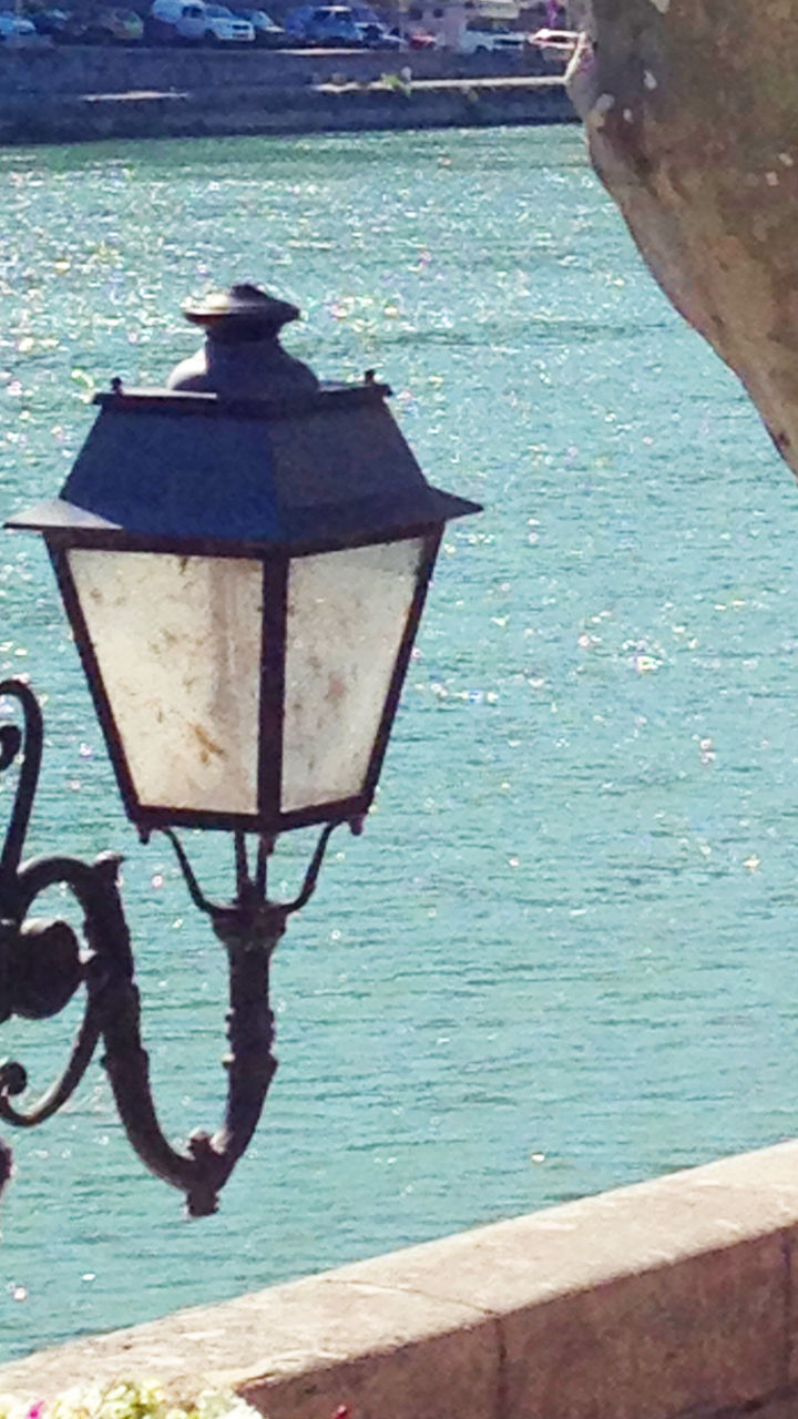 Riverside view with vintage lamp post