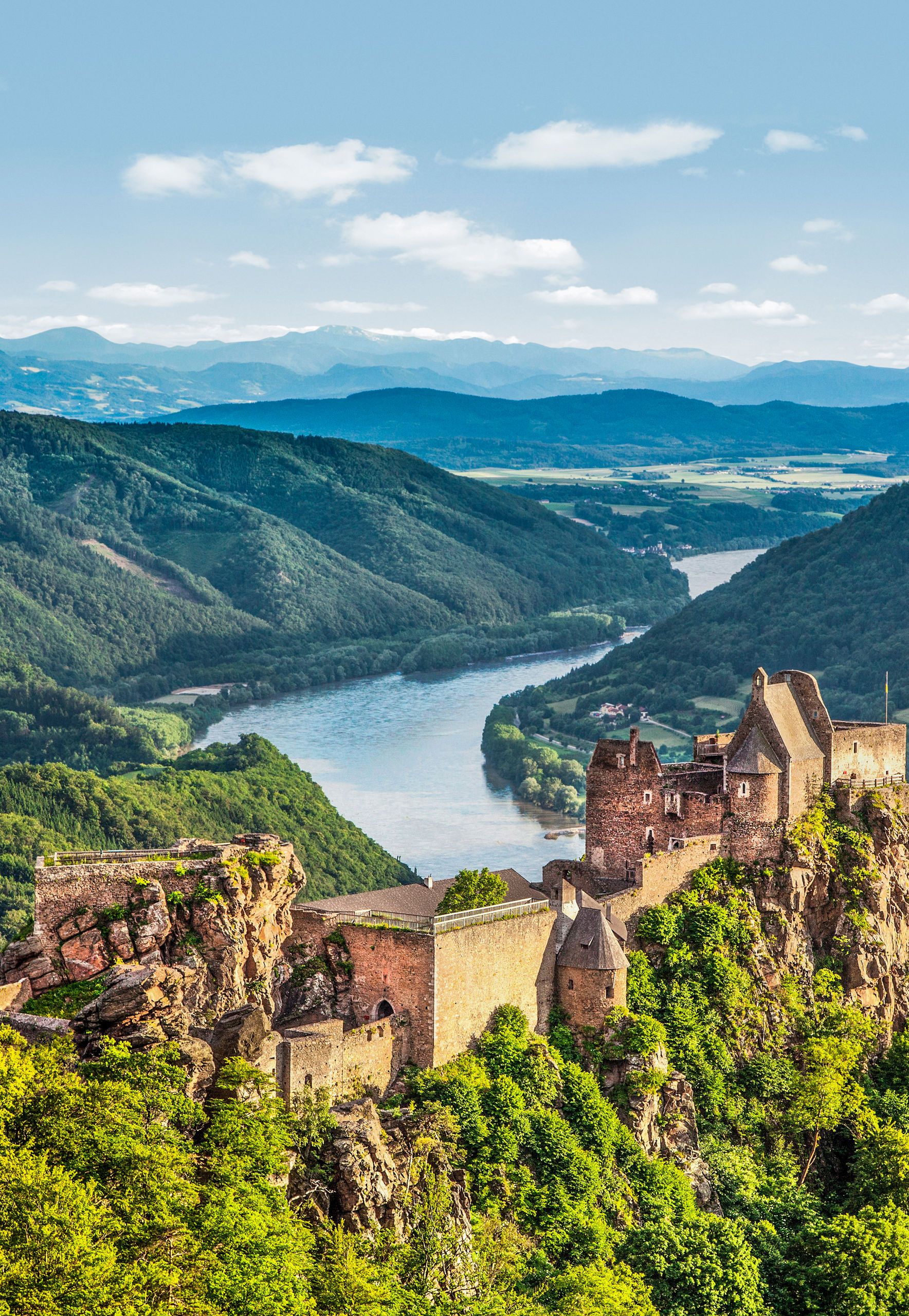 Scenic castle ruins overlooking lush valley