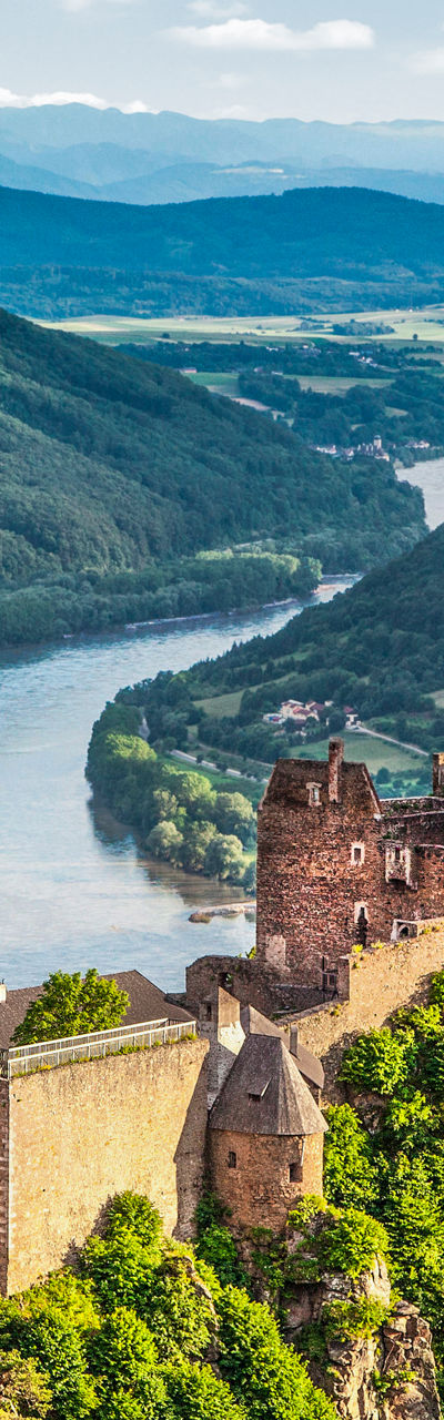Scenic castle ruins overlooking lush valley