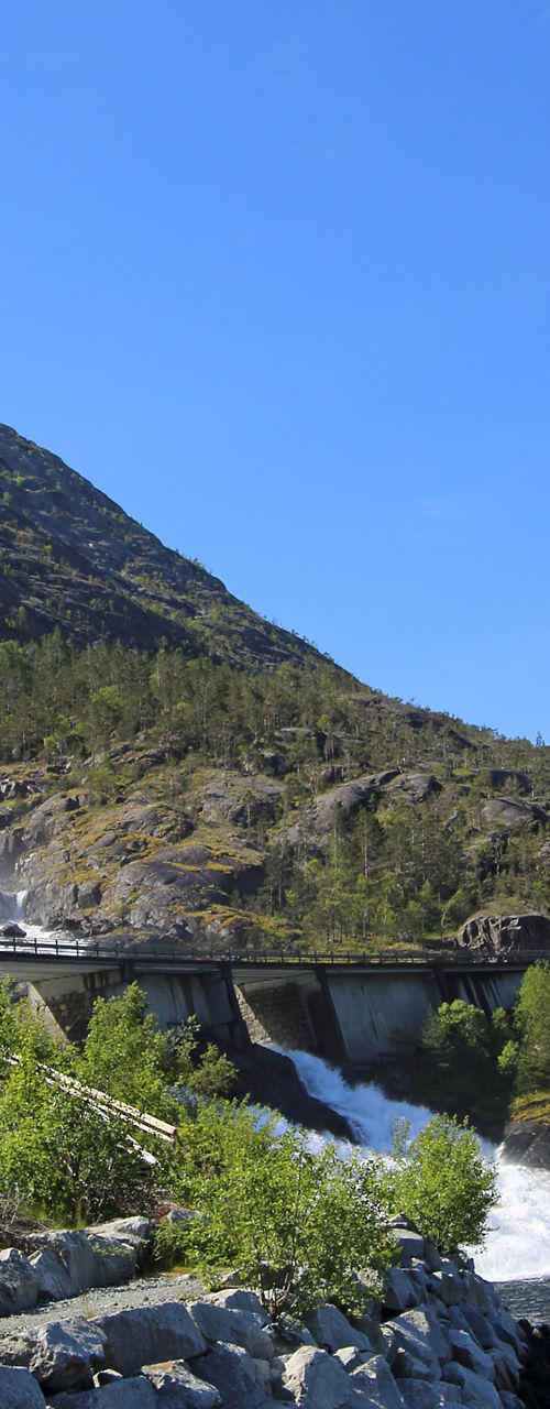 Scenic waterfall cascading into fjord
