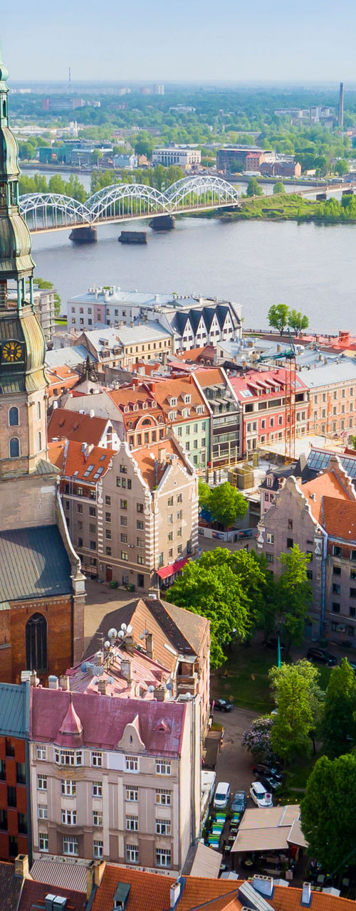 Aerial view of historic city with river and bridge
