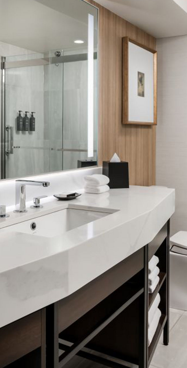 Modern hotel bathroom with large vanity