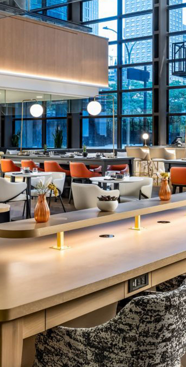 Modern hotel lobby lounge with communal table
