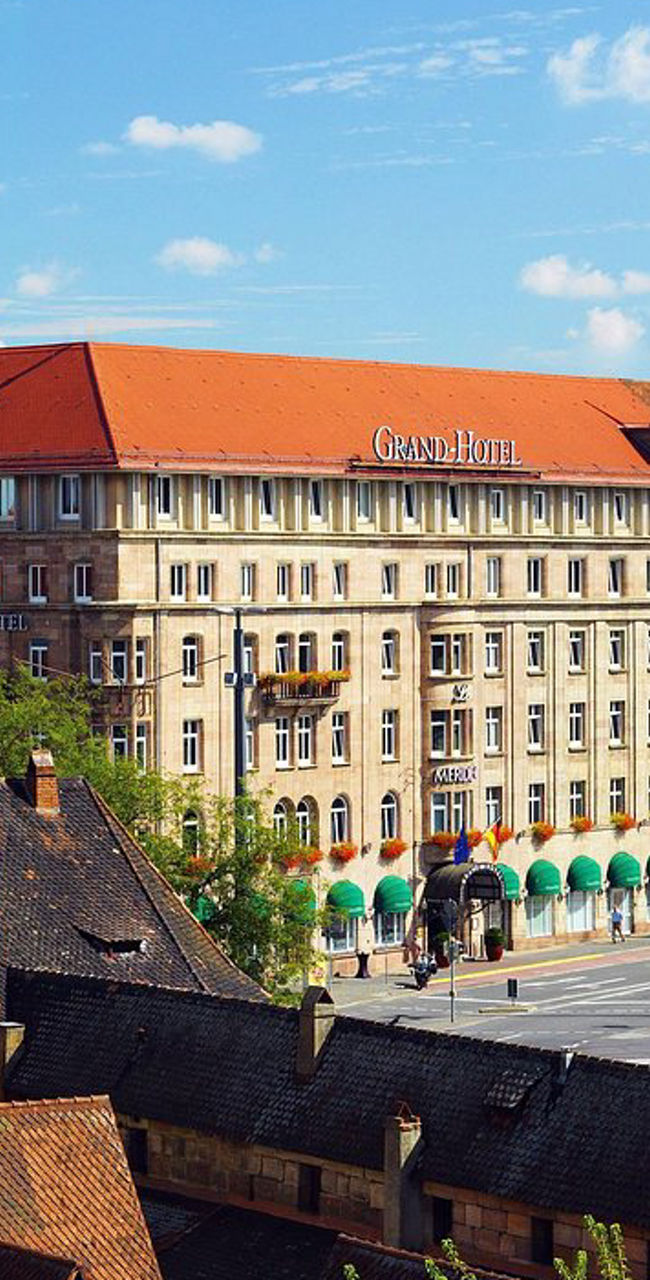 Historic city street with prominent hotel building