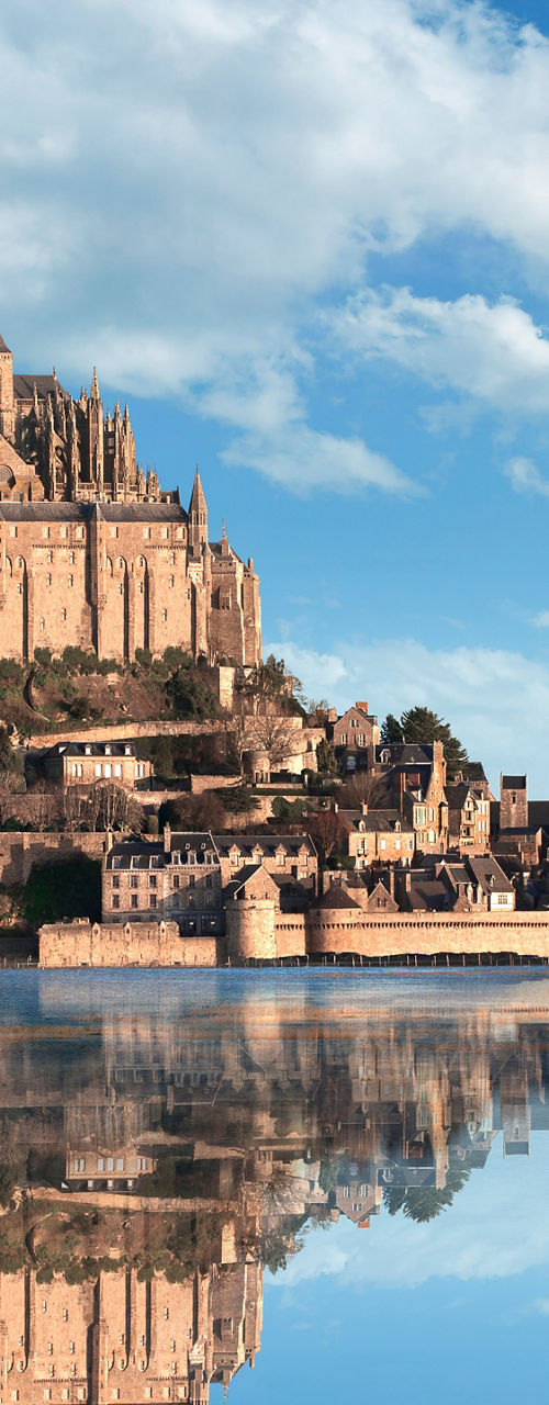Mont Saint-Michel island reflected in water
