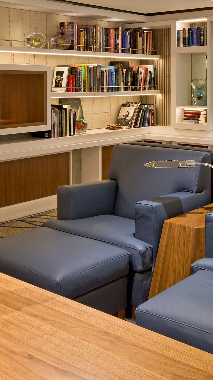 Modern lounge with bookshelves and decor