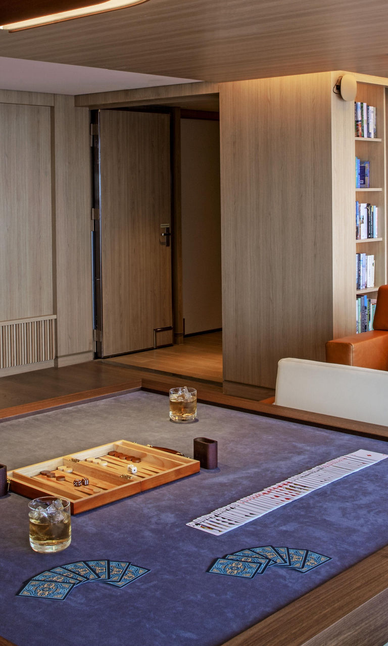 Modern lounge with game table and art