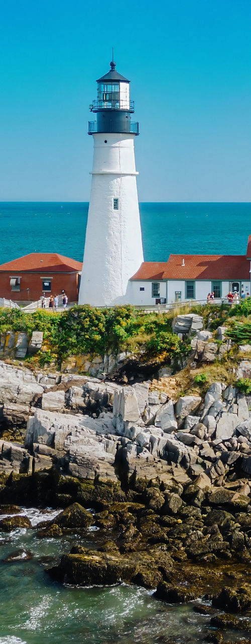 Scenic lighthouse on rocky coastline