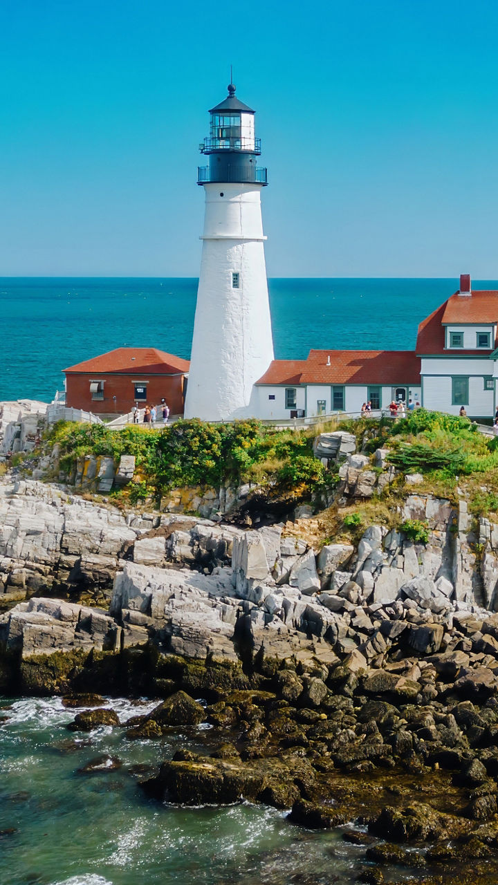 Scenic lighthouse on rocky coastline