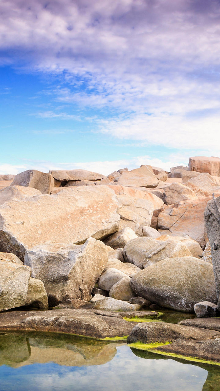 Scenic lighthouse on rocky coastline
