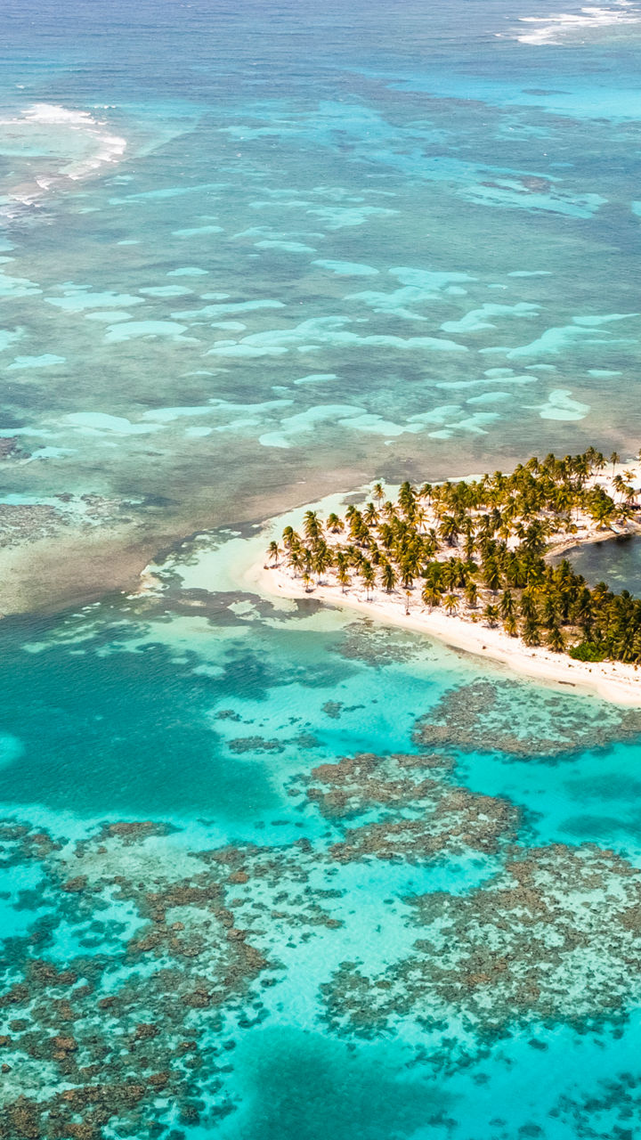 Aerial view of tropical island and reef