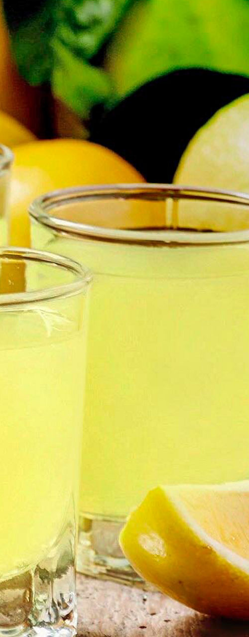 Fresh lemon drink with citrus fruits