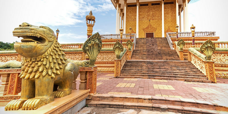 Golden temple with ornate lion statue