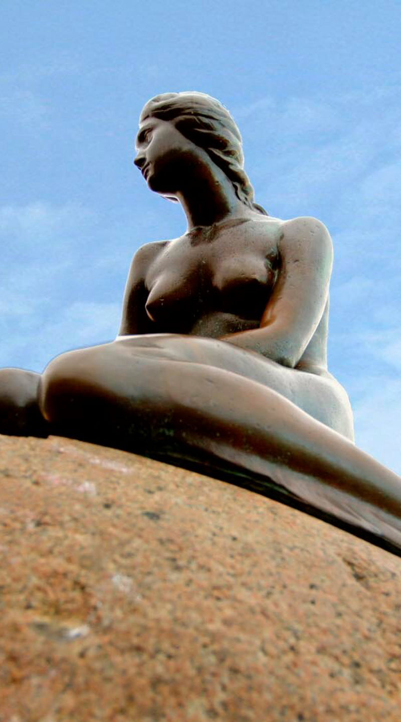 The Little Mermaid statue on rock