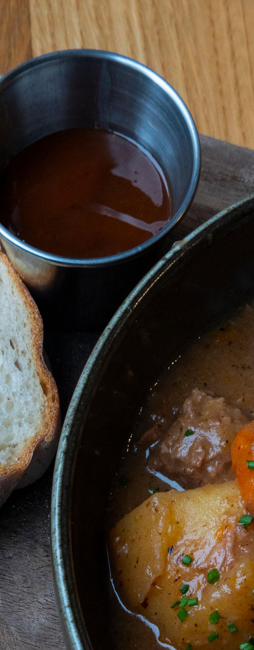 Rustic Beef Stew with Bread and Pickles