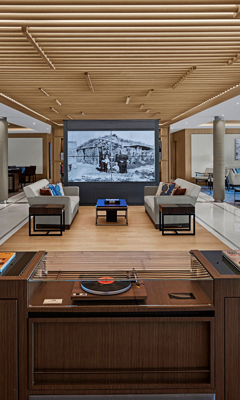 Modern lounge with wooden accents and vinyl player