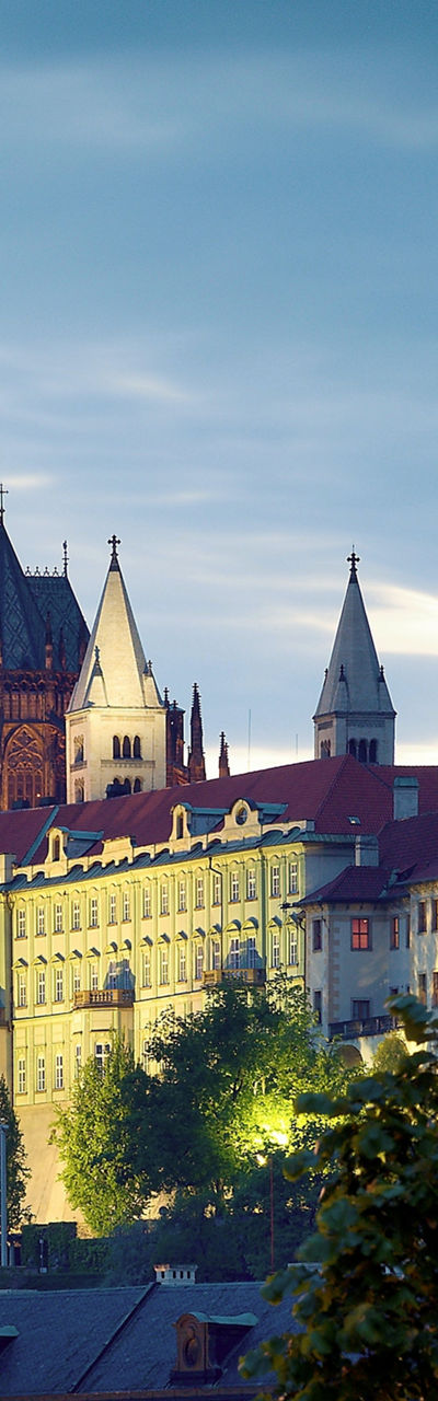 Prague Castle at dusk with streetlamp