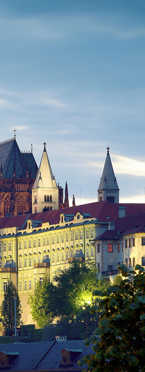 Prague Castle at dusk with streetlamp