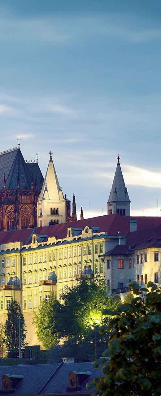 Prague Castle at dusk with streetlamp