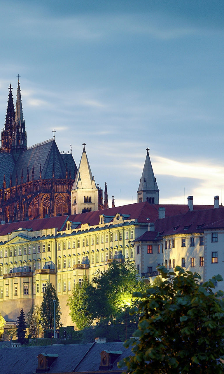 Prague Castle at dusk with streetlamp