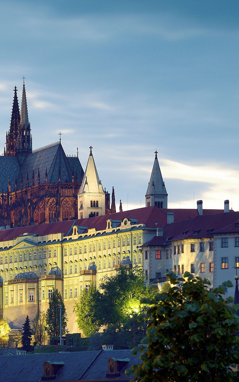 Prague Castle at dusk with streetlamp