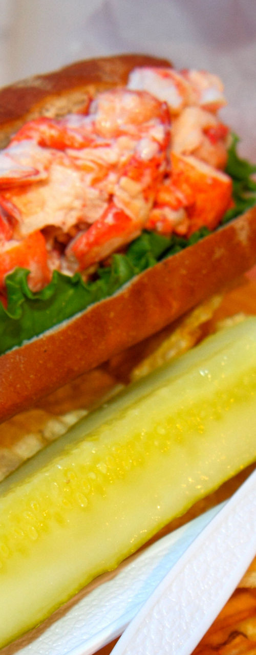 Lobster roll with chips and pickle