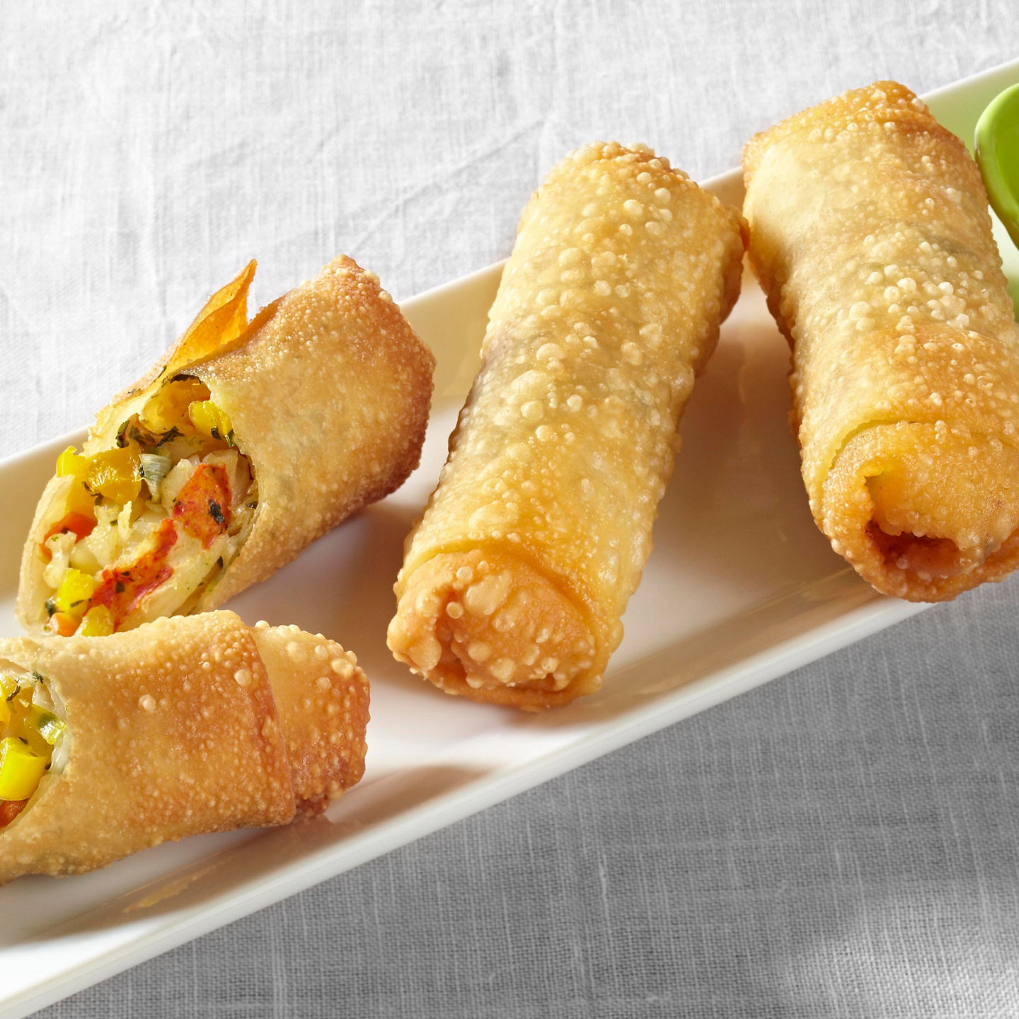 Vegetable spring rolls on white plate