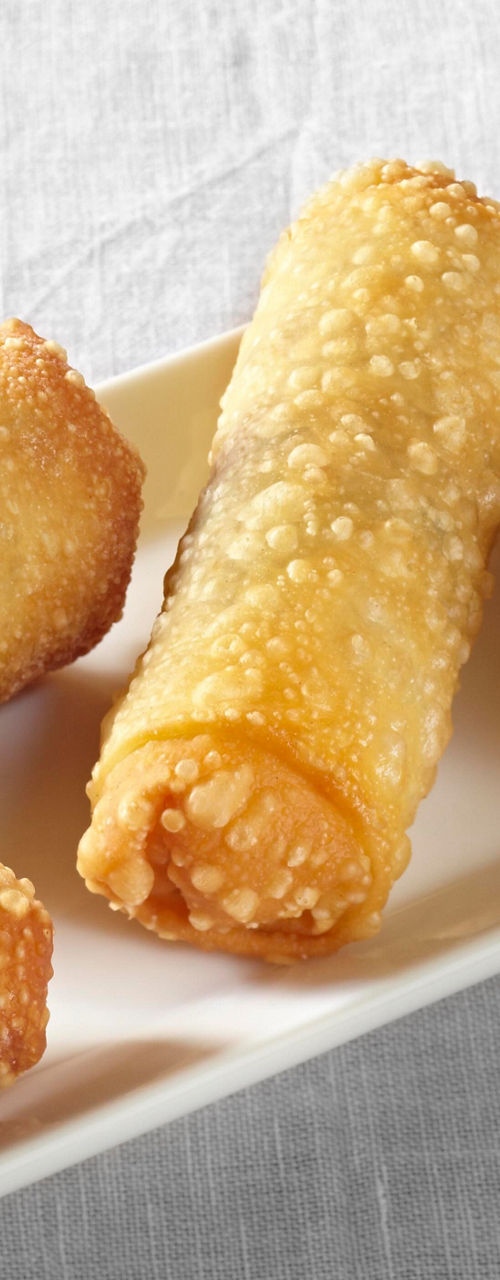 Vegetable spring rolls on white plate