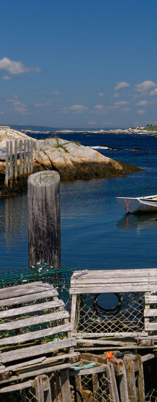 Scenic coastal village with lobster traps