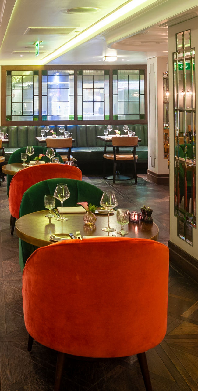 Elegant restaurant interior with colorful seating