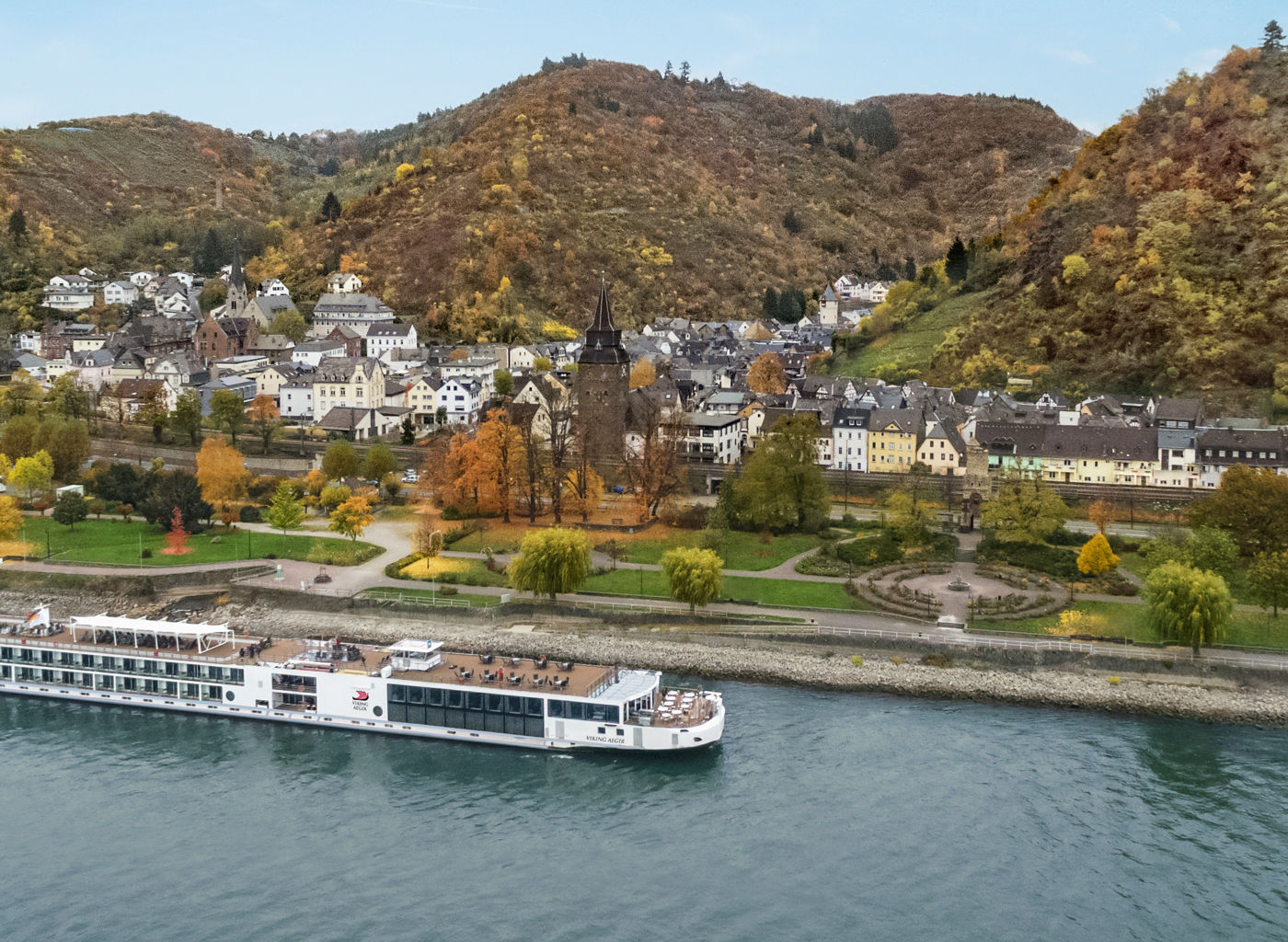 Scenic river cruise near hillside castle