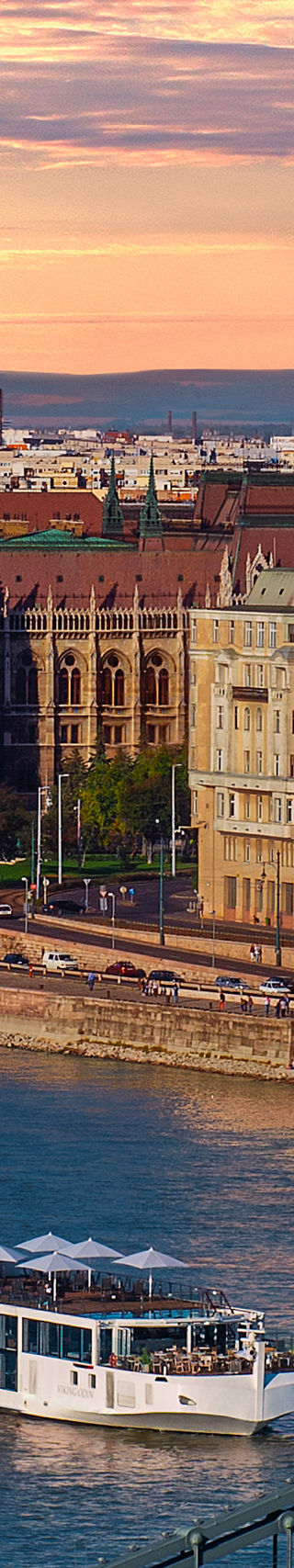 Budapest cityscape with Parliament and river cruise